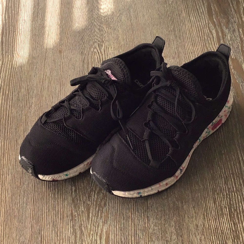 Woman’s ASICS running shoes size 8